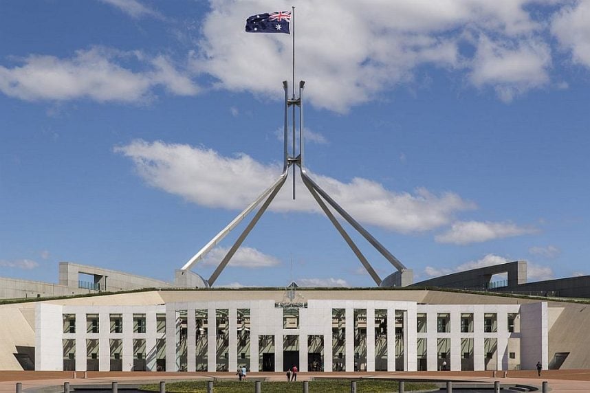 The Australian flag flies on top of the Australian Parliament House